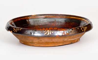 Rare Slip-Decorated Redware Bowl, possibly NC, late 18th or early 19th century