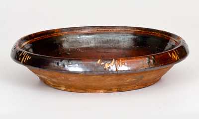 Rare Slip-Decorated Redware Bowl, possibly NC, late 18th or early 19th century