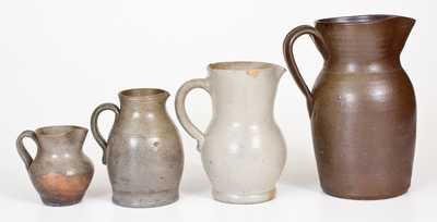 Four Salt-Glazed Stoneware Pitchers, primarily Southern origin, mid to late 19th century