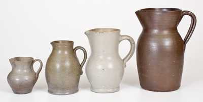 Four Salt-Glazed Stoneware Pitchers, primarily Southern origin, mid to late 19th century