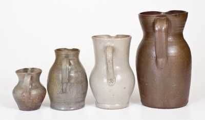 Four Salt-Glazed Stoneware Pitchers, primarily Southern origin, mid to late 19th century