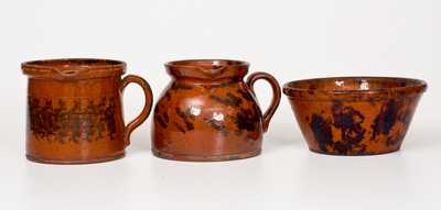 Lot of Three: Manganese-Decorated American Redware incl. Batter Pitchers and Bowl