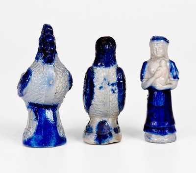 Three Cobalt-Decorated Stoneware Figural Whistles, German origin, late 19th century