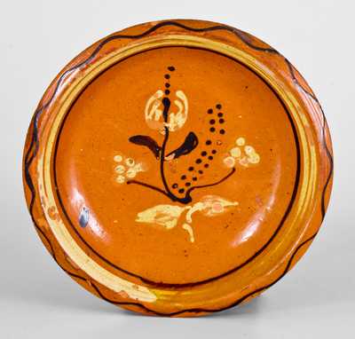 Fine Redware Bowl with Two-Color-Slip Floral Decoration, probably North Carolina