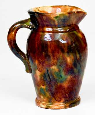 Shenandoah Valley Multi-Glazed Redware Cream Pitcher, att. to S. Bell & Sons, Strasburg