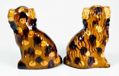 Fine Pair of Redware Spaniels with Yellow and Brown Splotches