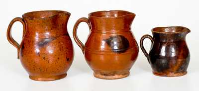 Lot of Three: Small-Sized New England Redware Pitchers w/ Manganese Decoration