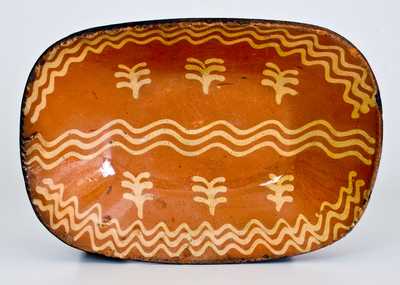 Fine Slip-Decorated Redware Loaf Dish, Philadelphia, PA origin, circa 1825