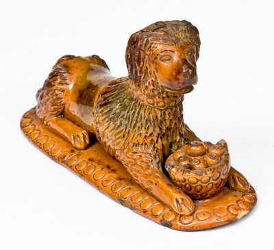 Rare Redware Figure of a Recumbent Dog with Basket, attributed to the John Bell Pottery, Waynesboro, PA