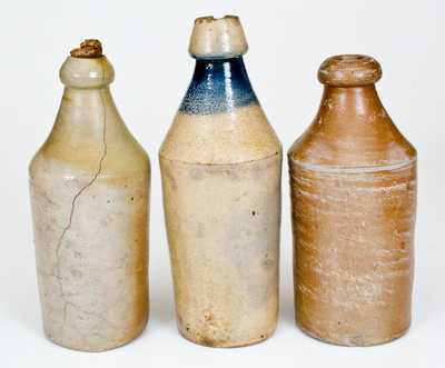 Three Stoneware Bottles, American, 19th century