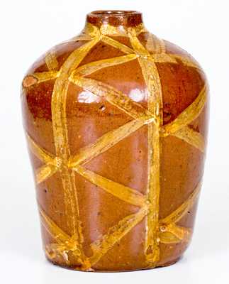 Exceptional and Important 18th Century Redware Tea Canister with Profuse Slip Decoration