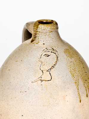 Rare Half-Gallon Ovoid Stoneware Jug with Incised Man s Head Decoration