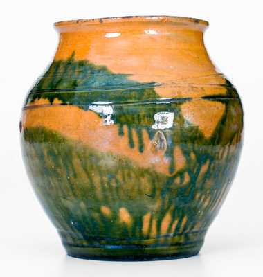 Outstanding C. A. Haun, Greene County, TN Redware Jar with Copper Slip Decoration