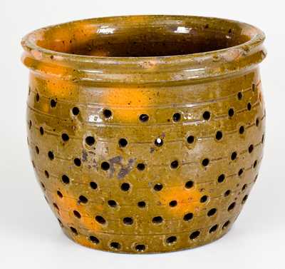 Unusual Glazed Redware Strainer, Pennsylvania origin