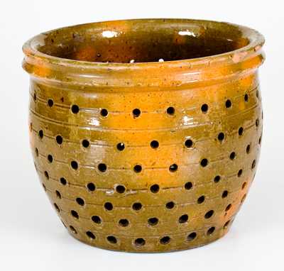 Unusual Glazed Redware Strainer, Pennsylvania origin