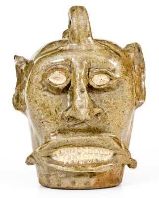 Rare and Important Mustached Face Harvest Jug, Edgefield District, SC, circa 1845-70
