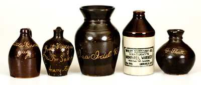 Lot of Five: Miniature Albany-Slip Stoneware Advertising Jugs with Urn