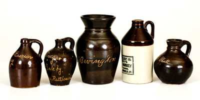 Lot of Five: Miniature Albany-Slip Stoneware Advertising Jugs with Urn