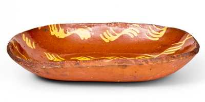 Large-Sized Redware Loaf Dish with Profuse Yellow Slip Decoration, probably Norwalk, CT