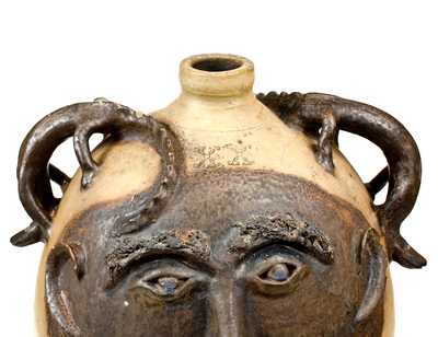 Exceedingly Rare and Important Twenty-Gallon Stoneware Face Water Cooler