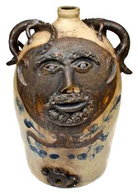 Exceedingly Rare and Important Twenty-Gallon Stoneware Face Water Cooler