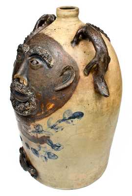 Exceedingly Rare and Important Twenty-Gallon Stoneware Face Water Cooler