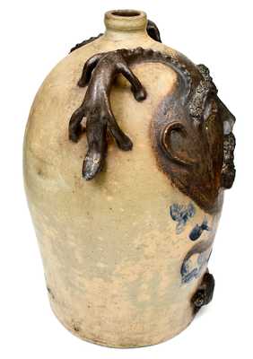 Exceedingly Rare and Important Twenty-Gallon Stoneware Face Water Cooler