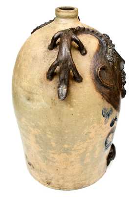 Exceedingly Rare and Important Twenty-Gallon Stoneware Face Water Cooler