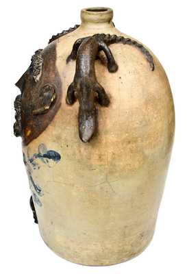 Exceedingly Rare and Important Twenty-Gallon Stoneware Face Water Cooler