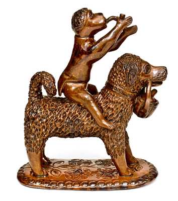 Exceptional Large-Sized Pennsylvania Redware Figure of a Dog with Monkey Rider