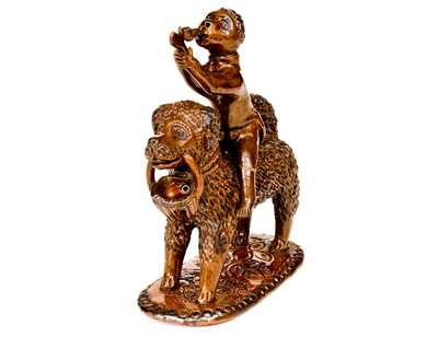 Exceptional Large-Sized Pennsylvania Redware Figure of a Dog with Monkey Rider