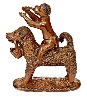 Exceptional Large-Sized Pennsylvania Redware Figure of a Dog with Monkey Rider