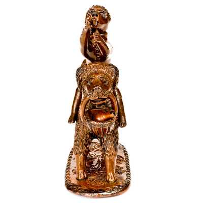 Exceptional Large-Sized Pennsylvania Redware Figure of a Dog with Monkey Rider