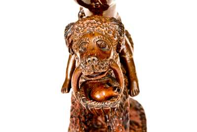 Exceptional Large-Sized Pennsylvania Redware Figure of a Dog with Monkey Rider