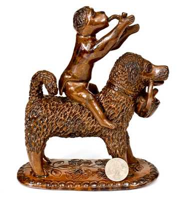 Exceptional Large-Sized Pennsylvania Redware Figure of a Dog with Monkey Rider