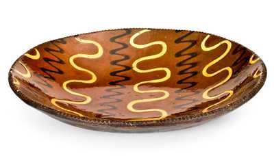 Outstanding Redware Platter with Profuse Yellow and Black Slip Decoration