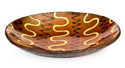 Outstanding Redware Platter with Profuse Yellow and Black Slip Decoration