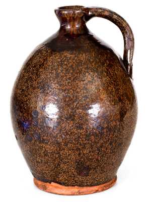 Ovoid New England Redware Jug with Manganese Glaze
