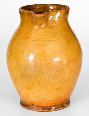 New England Redware Pitcher with Bright Orange Glaze