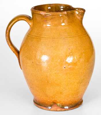 New England Redware Pitcher with Bright Orange Glaze