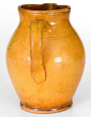 New England Redware Pitcher with Bright Orange Glaze