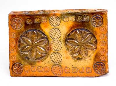 Rare Stamp-Decorated Redware Doorstop, PA origin, 19th century