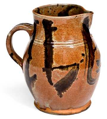Rare and Important Slip-Decorated New England Redware Pitcher