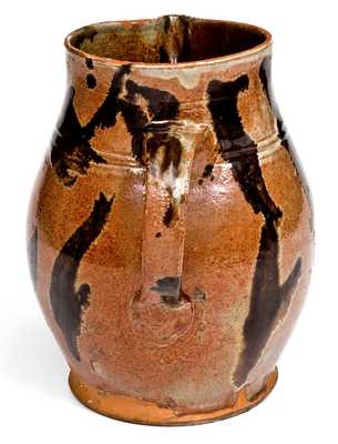 Rare and Important Slip-Decorated New England Redware Pitcher