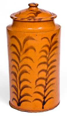 Rare and Important Slip-Decorated New England Redware Jar with Lid