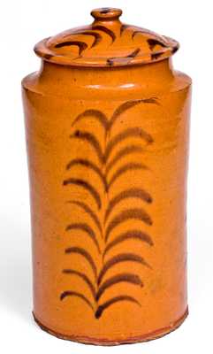 Rare and Important Slip-Decorated New England Redware Jar with Lid