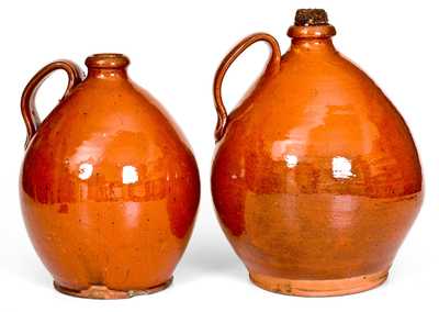 Near Pair of Glazed New England Redware Jugs