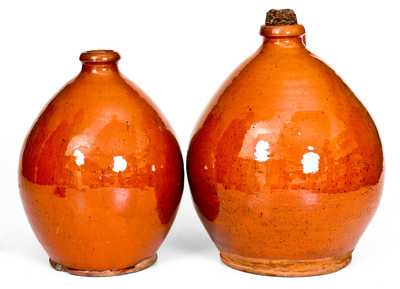 Near Pair of Glazed New England Redware Jugs