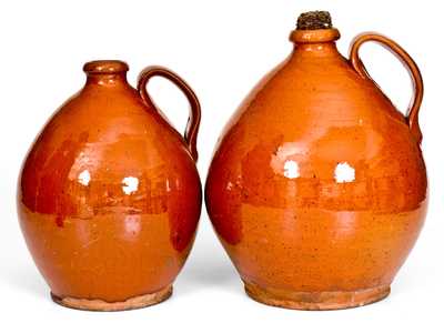 Near Pair of Glazed New England Redware Jugs