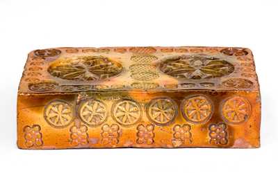Rare Stamp-Decorated Redware Doorstop, PA origin, 19th century